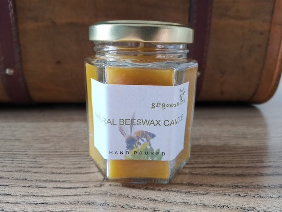 Beeswax Candle In a Hexagonal Clear Glass Jar With Gold Lid