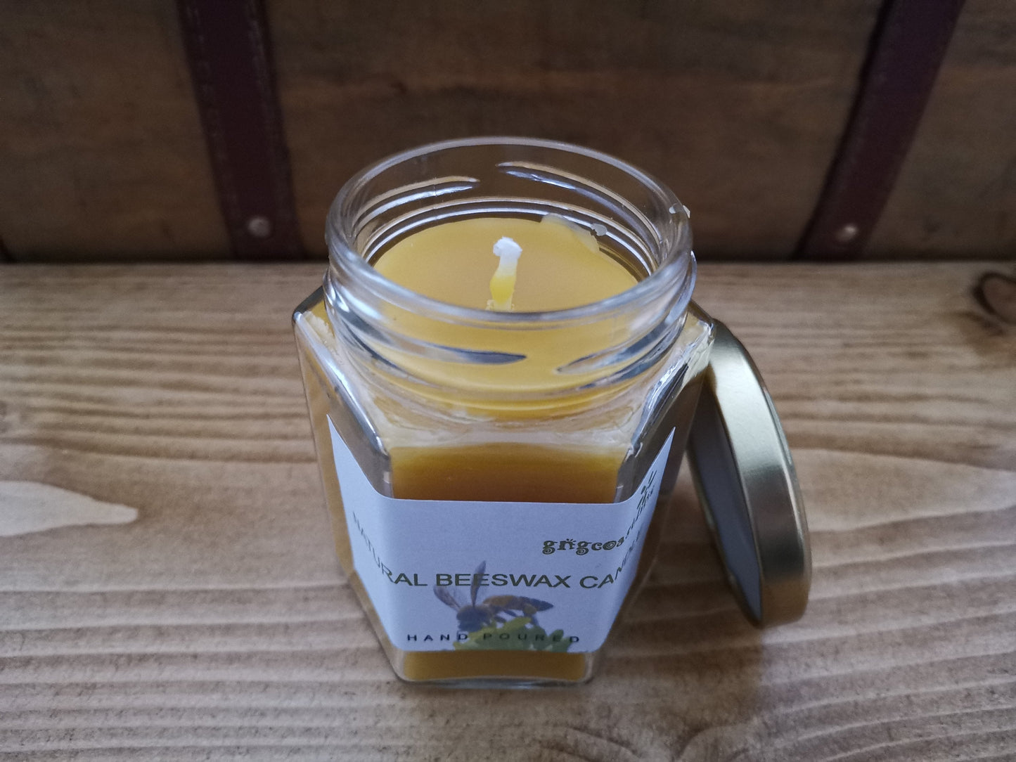 Beeswax Candle In a Hexagonal Clear Glass Jar With Gold Lid