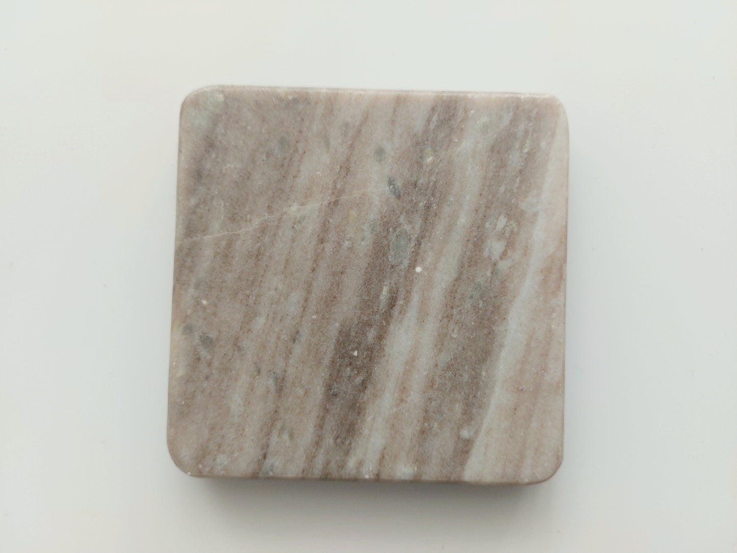 Smooth, matte, natural marble coasters, mix of beige, cream to brown colour